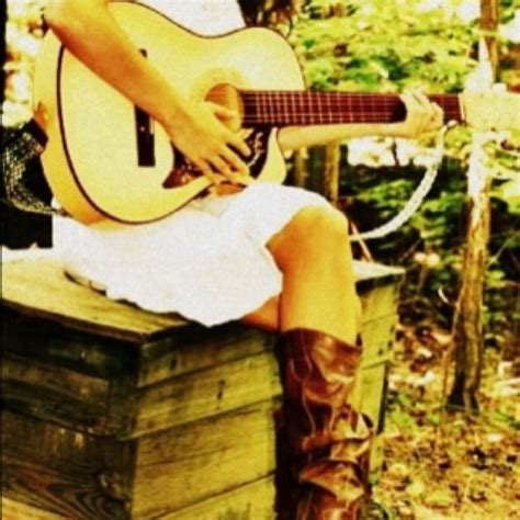 This Country Girl Loves Her Guitar