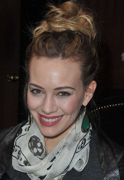 Weekend Hairstyle Idea A Messy Top Knot Like Hilary Duff Has Here