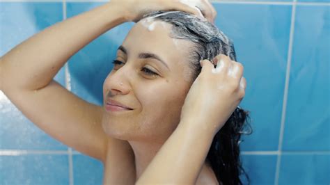 Woman Washing Hair Stock Footage SBV Storyblocks