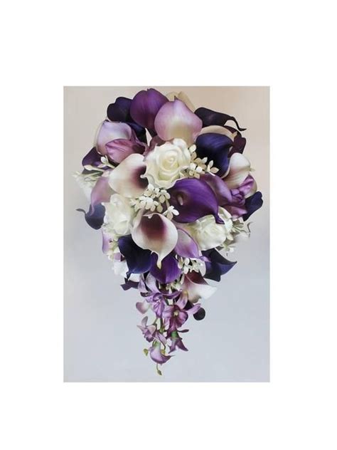 Cascade bouquets are perfect if you're looking to bring the drama on your wedding day. Cascading Wedding Calla Lily Bouquet Purple Bouquet Bridal ...