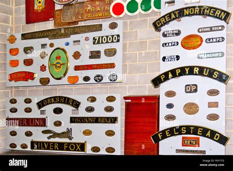 A Display Of Historic Assorted Locomotive Nameplates And Makers Plates