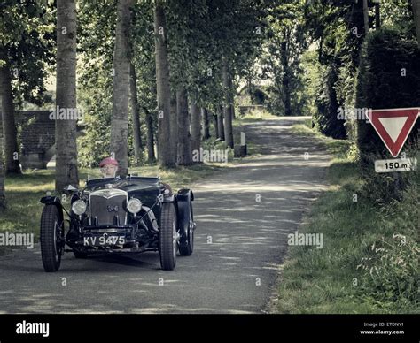 1934 Riley Ulster Imp Driving On A French Country Road Stock Photo Alamy