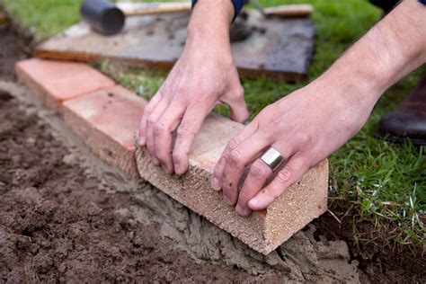 Use your imagination and be creative. How to Edge a Lawn with Bricks - BBC Gardeners' World Magazine