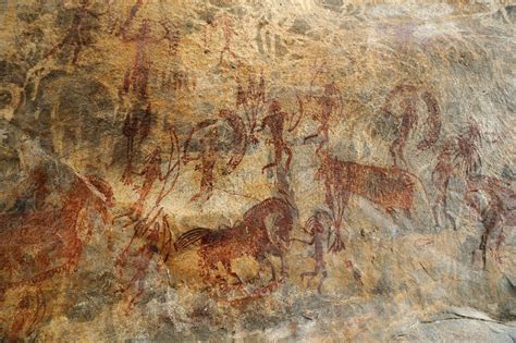 Some Animals And People Are Depicted In This Rock Painting