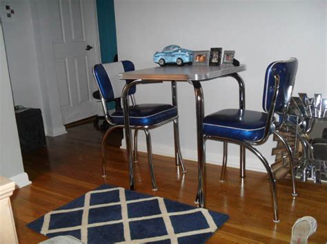 Inlaid designs like the apples in the photo above. Retro Dinette Set in New York