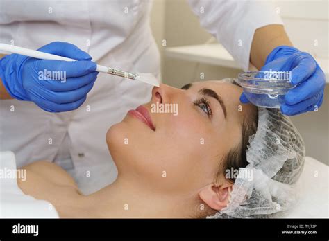 Cosmetologist Applies Moisturizing Conductive Gel Before Ultrasonic