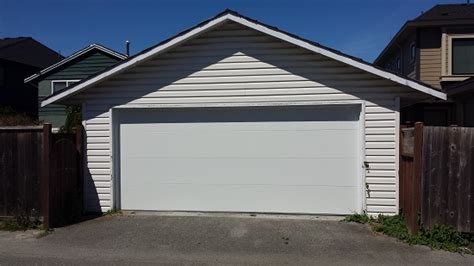 Replacing your garage door can actually raise the value of your home. Therma Tech T108 Insulated Steel Garage Door Richmond ...