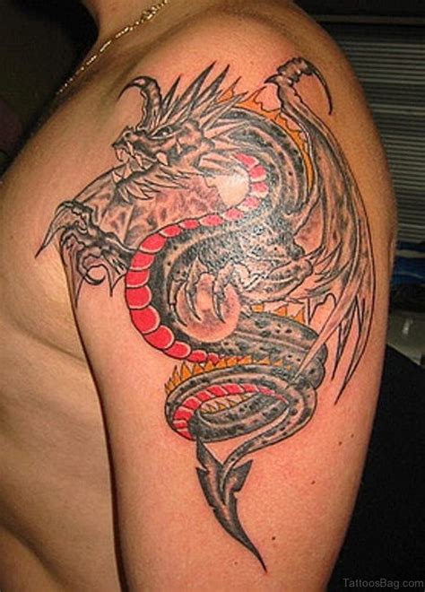 4.use the wet sponge or towel to wet the tattoo completely. 72 Outstanding Dragon Shoulder Tattoos