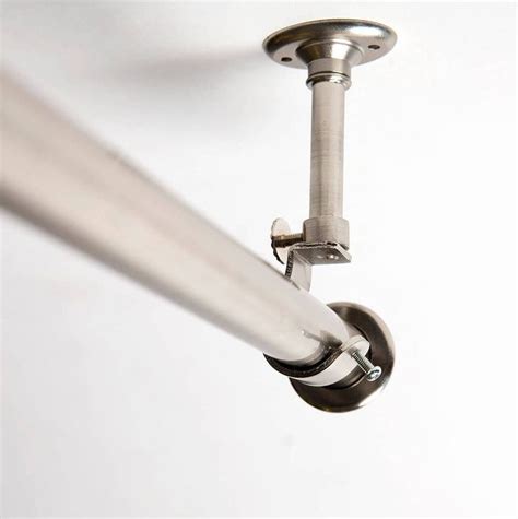 Formal living rooms need something more than a standard curtain rod to exude elegance and timelessness. Ceiling mount curtain rods | Hanging curtain rods, Hanging ...