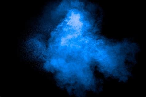 Premium Photo Blue Color Dust Particles Explosion