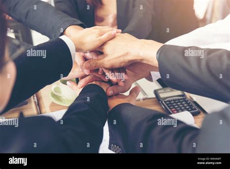 Close Up Of Stack Hands Of Business People Join Hand Together Business