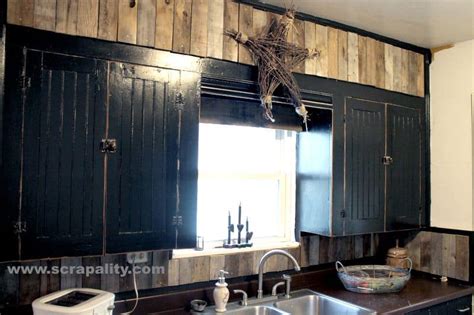 My cabinets were done by 2 very sweet women from a company called bella terra designs. Black Chalkboard Cabinets With Pallet Board Backsplash ...