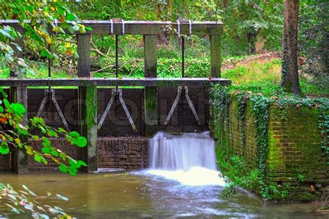 Wooden Dam Small Waterfall And Forest Stock Image Colourbox