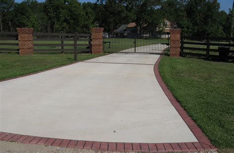 Plain Concrete Driveway With Brick Borders Concrete Driveways