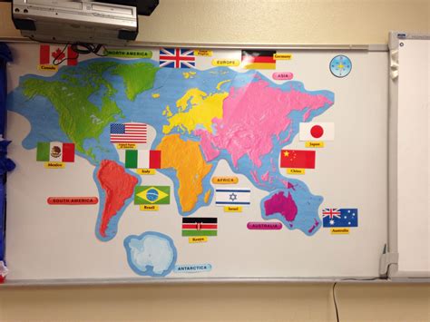 7 Continents Taped On And Some Of Their Countries Flags Magnets