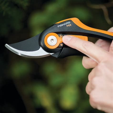 Fiskars Steel Bypass Hand Pruner With Standard Handle In The Hand