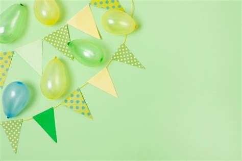 Birthday Decoration On Green Background With Copy Space Free Photo