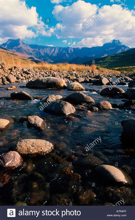 Tugela River Flowing Over Boulders Amphitheatre In Background Royal