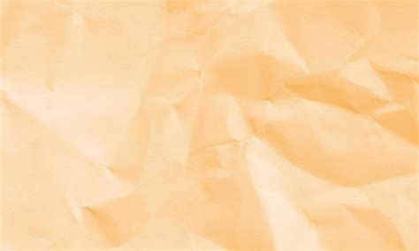 Light Orange Colored Crumpled Paper Texture Background For Design