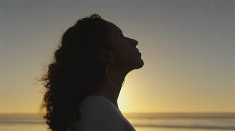 A Woman Praying At Sunset Filmpac