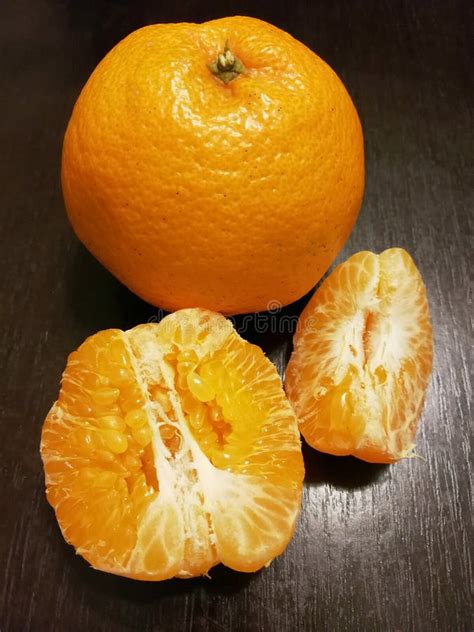 Peeled Mandarin Orange On Black Stock Photo Image Of Black Natural