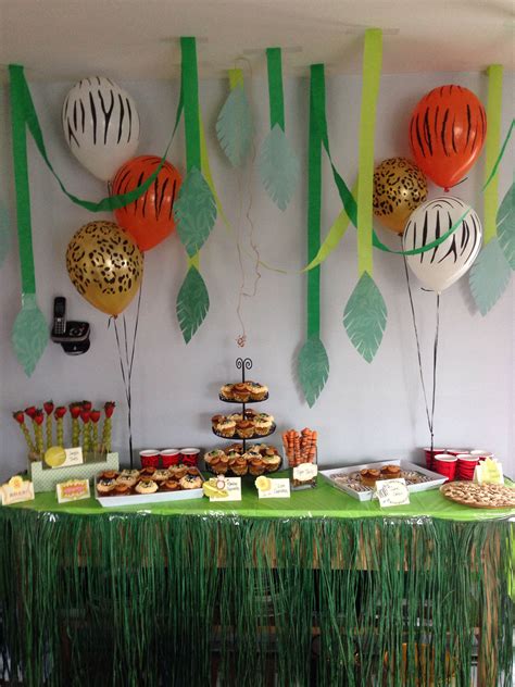 Jungle theme party decorations | couple more jungle party planning ideas and resources Jungle / safari theme first birthday party dessert / snack ...