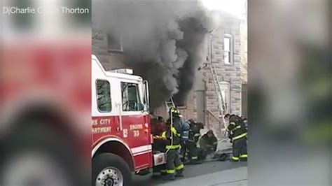 6 firefighters pulled from Baltimore house fire - YouTube