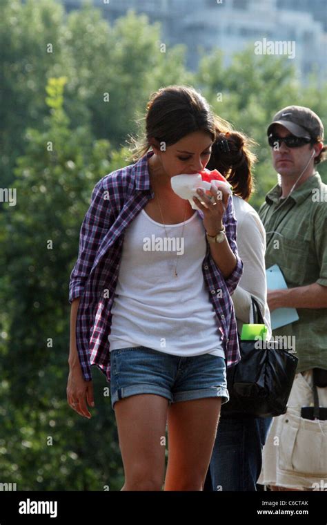 Mila Kunis Eats A Watermelon On The Set Of Friends With Benefits New