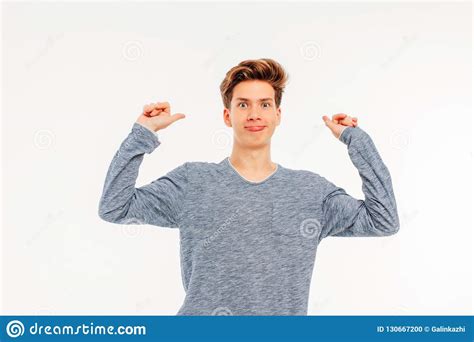 Smiling Young Guy Welcomes Saying Goodbye To Hand On White Background
