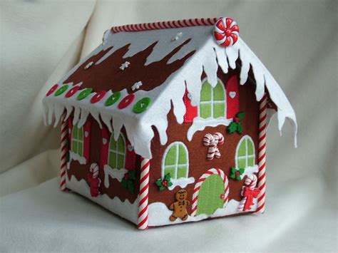 A Gingerbread House Is Decorated With Candy Canes