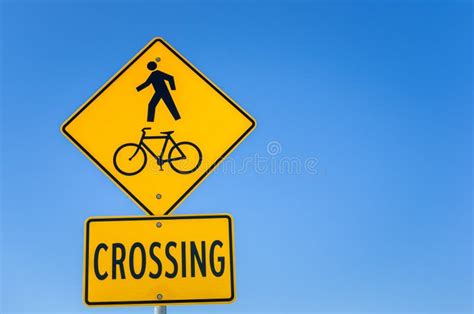 Warning Sign Against Pedestrian And Bicycle Crossing Stock Photo