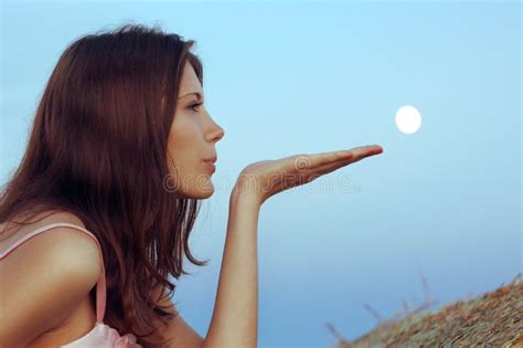 Beautiful Brunette Blows The Moon With Palm Stock Image Image Of Face Elegant 26379153
