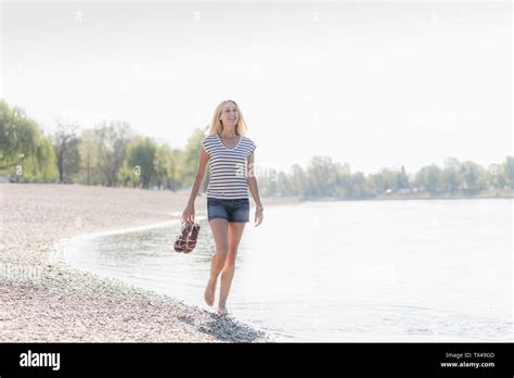Mature Woman Wading In Water Hi Res Stock Photography And Images Alamy