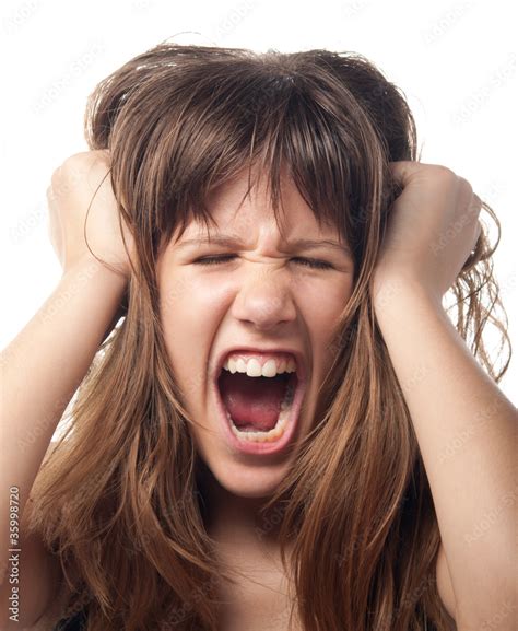 Angry And Frustrated Teenage Girl Screaming Stock Photo Adobe Stock