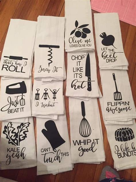 The Kitchen Towels Are Laid Out On The Floor With Their Names And