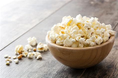 Popcorn In Bowl On Wooden Table Stock Photo Image Of Food Delicious