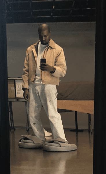 Kanye West Wears Oversized Slide Sandals