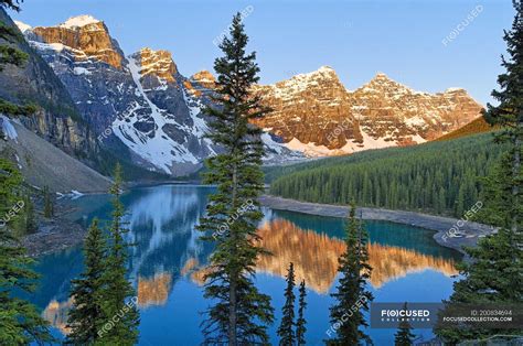 Mountains Reflecting In Water Of Moraine Lake At Dawn Valley Of Ten