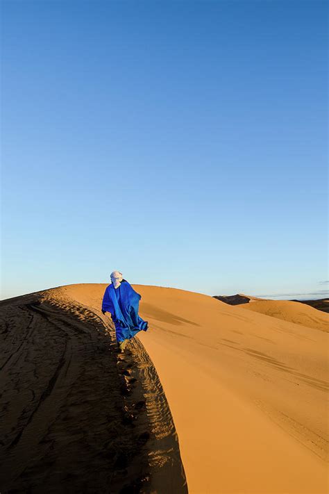 Man Walking In The Desert By Paolo Negri