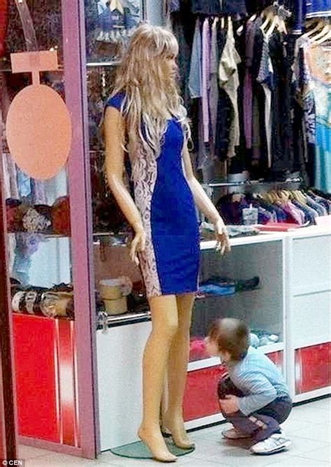 Curious Boy In Russia Puts Hand Up Mannequin S Dress And Peeks Up It Daily Mail Online