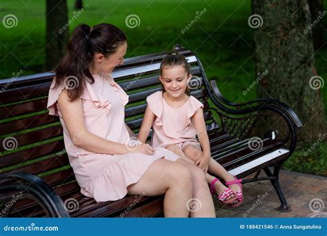 Mother And Daughter 5 6 Years Old Walking In The Park In The Summer Mother Talking To Her