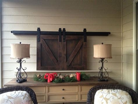 Each rolling hardware product represents the perfect marriage between art and function. Barn Doors over TV - custom sized and finished. www ...