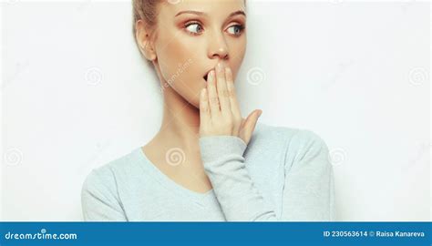 Indoor Shot Of Stupefied Shocked Blonde Woman Keeps Mouth Widely Opened