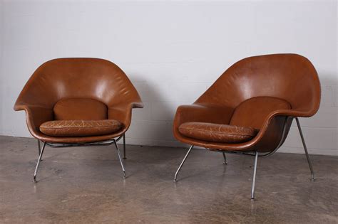 The set owes much of its popularity to the simple, sweeping structure with indented armrests and movable cushions that enable. Pair of Early Womb Chairs by Eero Saarinen in Original ...