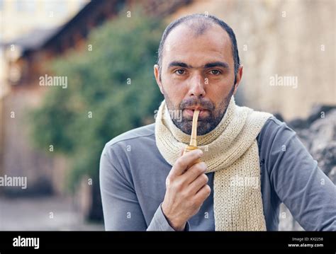 Man With A Smoking Pipe Stock Photo Alamy