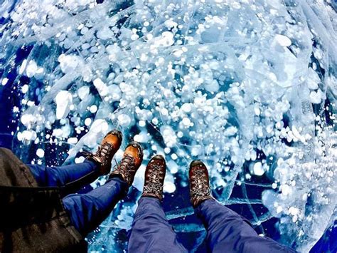 Standing On Ice Bubbles Abraham Lake Banff National Park National