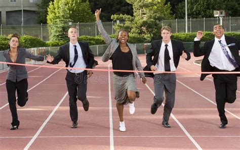 Business People Running Across The Finish Line Stock Image Image Of