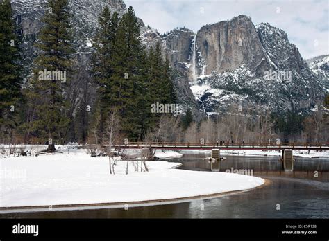 Merced River With Yosemite Falls In The Background During Winter