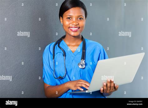 Attractive African American Female Nurse Using Laptop Stock Photo Alamy