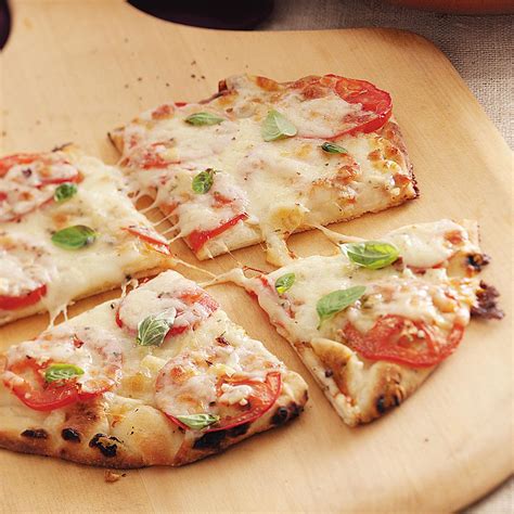 It can be opened up to form a pocket which can be stuffed with a variety of fillings. Margherita Pita Pizzas Recipe | Taste of Home
